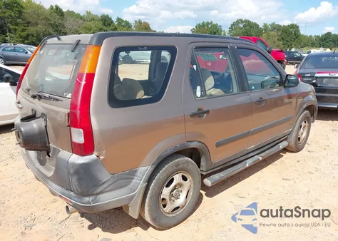 2002 Honda Cr-V Lx z USA, uszkodzony, nr VIN JHLRD68412C014452